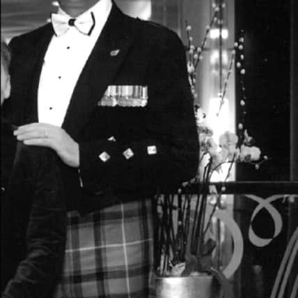Phillip Hufton with the medals he bought