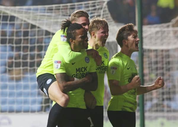Posh players celebrate what they thought would be the winning goal at Coventry, one scored by Ivan Toney. Photo: Joe Dent/theposh.com.
