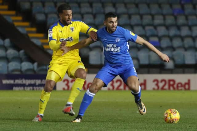 Posh left-back Colin Daniel in action against Wimbledon. Photo: Joe Dent/theposh.com.