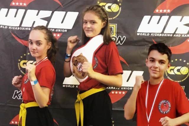 TASK medal winners, from the left, Eva Andrulyte, Skaiste Stukaite and Braydon Popat-Evans.
