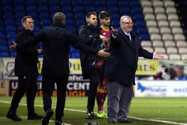 Posh manager Steve Evans displays frustration during the FA Cup tie with Bradford City. Photo: Joe Dent/theposh.com.