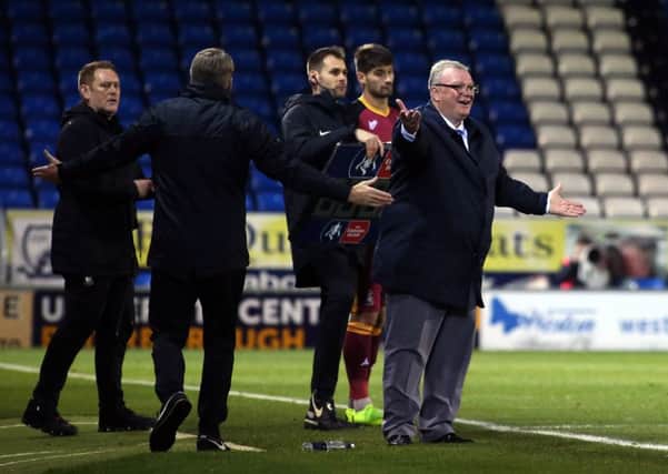 Posh manager Steve Evans displays frustration during the FA Cup tie with Bradford City. Photo: Joe Dent/theposh.com.