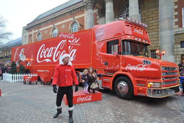 Coca-Cola truck in city centre at Bridge street. ENGEMN00120131215155527