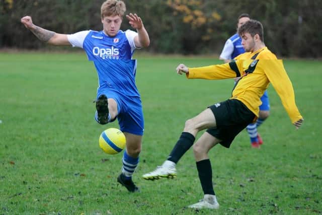 Action from Glinton & Northborough v Orton Rangers (blue) at AMVC. Photo: David Lowndes.