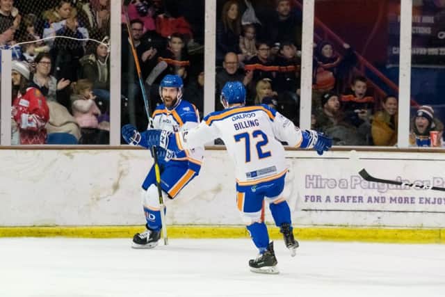 James Ferrara celebrates scoring his second goal against Swindon on Sunday night.