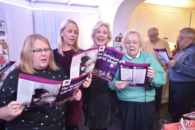 Carol singing in aid of disabled children in Ukraine