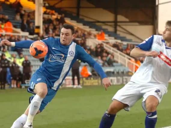 Lee Tomlin in action for Posh