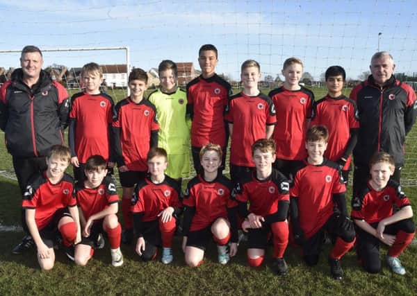 Netherton Under 13s are pictured before their 5-2 win over Whittlesey Blue. They are from the left, back, Dean Gothard, Harley Tether, Alastair Sloan, Eryk Iskrzycki, Austin Sealy, Harry Gothard, Danny White, Dhuruv Karavdra, Shaun Maloney, front, Keane Rippon-Hart, Leo Maloney, Elliott Hannan, Charlie Jacobs, Jack Kent, Gabriel Bowden and Jake Barnes.