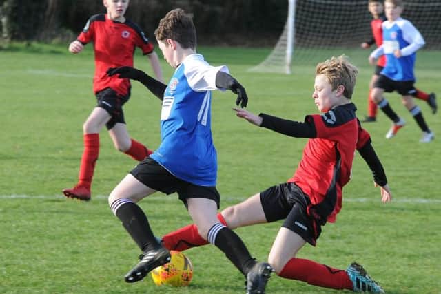 Action from the game between Whittlesey Under 13s and Netherton.