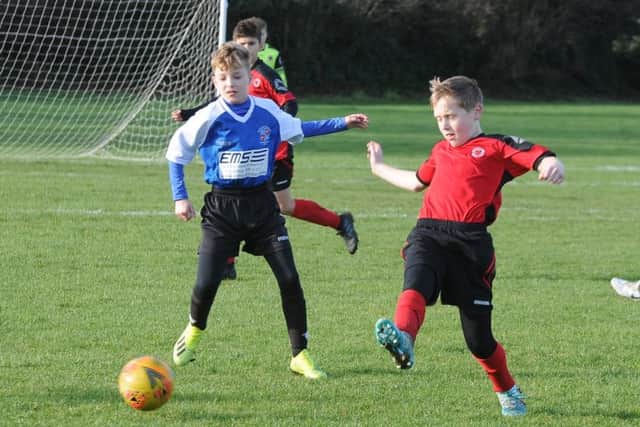 Action from the game between Whittlesey Under 13s and Netherton.