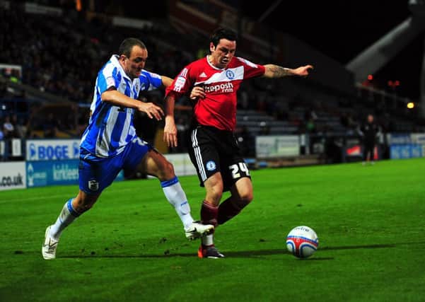 Lee Tomlin in action for Posh in 2010.