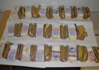 Some of the cash found by officers
