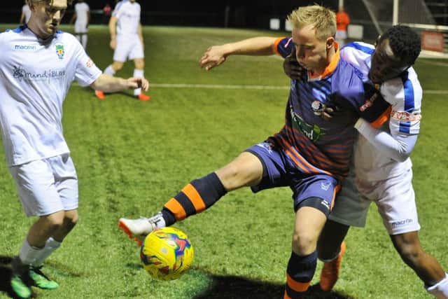 Action from Yaxley's 2-0 win against Dunstable Town (white) at In2itive Park. Photo: David Lowndes.