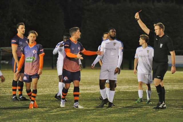 Matt Sparrow (left) os Yaxley is sent off in the game against Dunstable. Photo: David Lowndes.