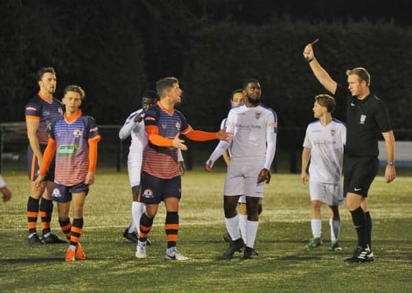 Matt Sparrow (left) os Yaxley is sent off in the game against Dunstable. Photo: David Lowndes.