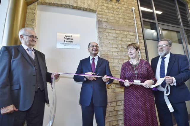 Official opening of the new Sand Martin House PCC offices at Fletton Quays -  Shailesh Vara MP cuts the ribbon to open the building EMN-181019-173223009