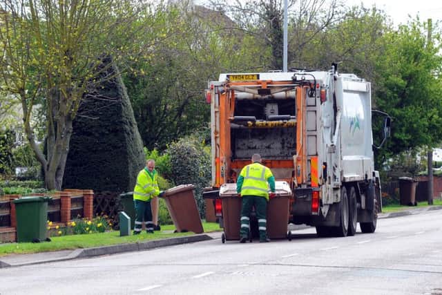 Brown bins being collected in Werrington EMN-140904-085451001