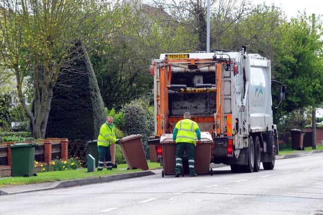 Brown bins being collected in Werrington EMN-140904-085451001