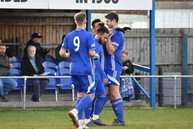 Peterborough Sports players celebrate a Dion Sembie-Ferris goal against Berkhamsted. Photo: James Richardson.