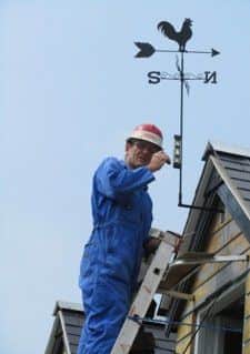 John working on the house