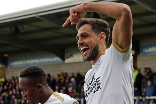Ryan Tafazolli (right) and Siriki Dembele should both be in action for Posh at Middlesbrough.