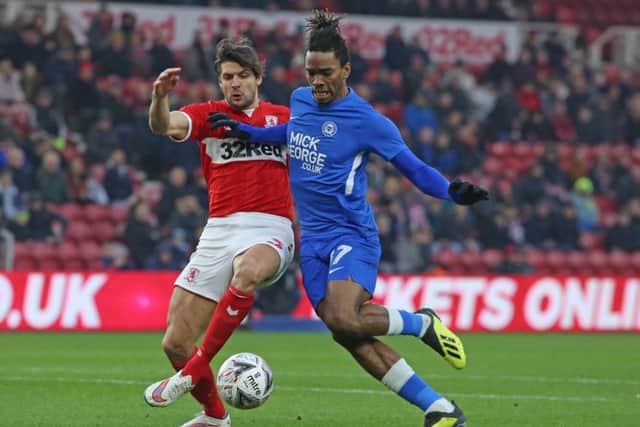 Ivan Toney of Peterborough United in action with George Friend of Middlesbrough. Picture:  Joe Dent