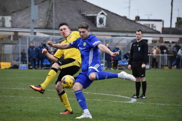 Mark Jones shoots at goal for Peterborough Sports against North Leigh. Photo: James Richardson.