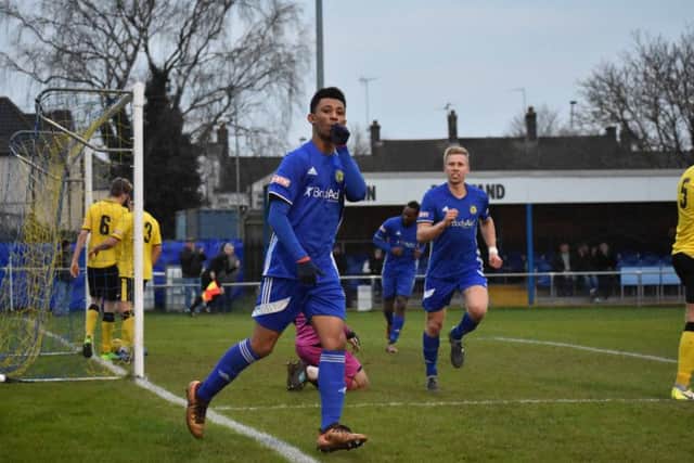Dion Sembie-Ferris celebrates his goal for Peterborough Sports against North Leigh. Photo: James Richardson.
