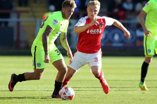 Kyle Dempsey (right) in action for Fleetwood against Posh in 2016.