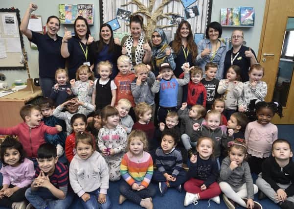 Staff and children at the Cygnets pre-school at Hampton -  who have gained an outstanding OFSTED EMN-190115-112700009