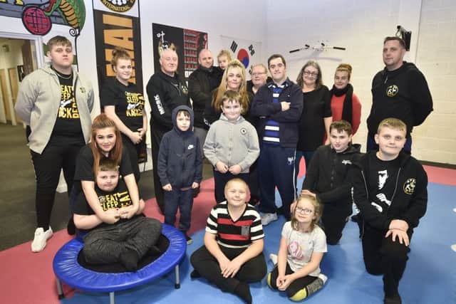 Staff, parents and children attending  martial arts classes for children with additional needs at  MPSK, Bretton. EMN-190801-184401009