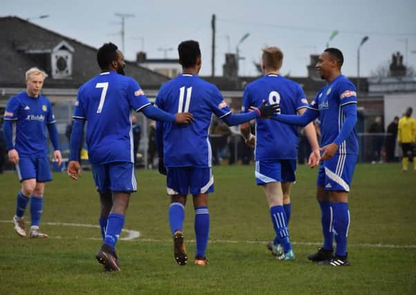 Peterborough Sports players celebrate a goal against North Leigh. Photo: James Richardson.