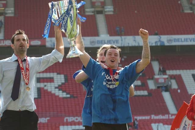 Lee Tomlin (right) celebrates Posh's 2011 League One play-off final win at Old Trafford.