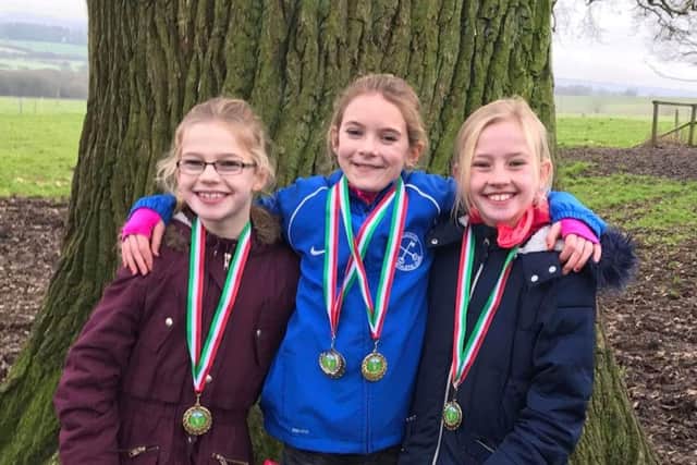 Peterborough Athletic Clubs Under 11 girls team that won team gold in the Lincolnshire championships. They are Ffion Perkins,  Lola Gaches and Faith Perkins.