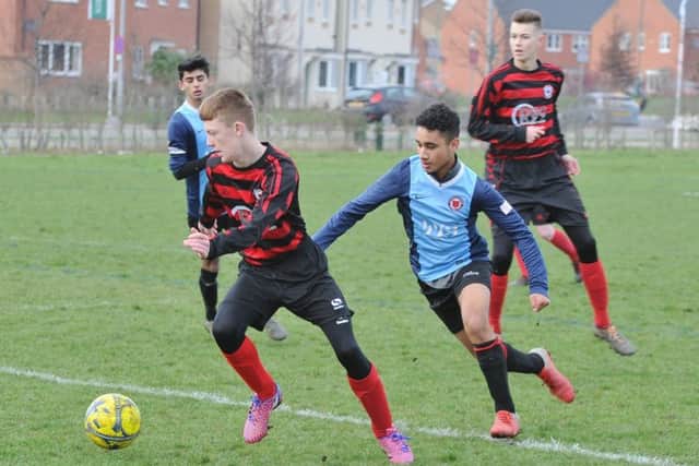 Action from the game between Netherton Under 16s and  Park Farm Pumas Black.
