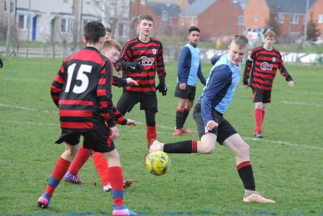 Action from the game between Netherton Under 16s and  Park Farm Pumas Black.