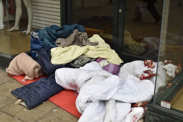 Rough sleepers' belongings in Long Causeway EMN-190115-163729009