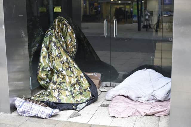Rough sleepers' belongings in Long Causeway EMN-190115-163729009