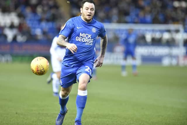 Posh star Lee Tomlin chases a through ball in the win over Rochdale. Photo: David Lowndes.