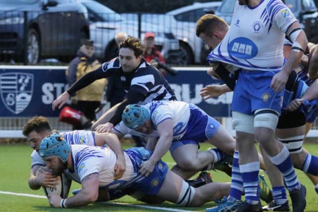 Tom Lewis scores a try for the Lions against Stourbridge. Picture: Mick Sutterby