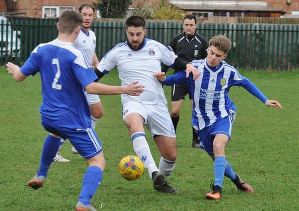 Action from a Peterborough Premier Division draw between Peterborough Sports Development and ICA Sports. Photo: David Lowndes.