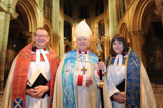 Installation of Revd Canon Sarah Brown as Residentiary Canon at Peterborough Cathedral pictured with   The Very Revd. Christopher Dalliston, Dean of Peterborough Cathedral and  Bishop of Peterborough  Rt Revd. Donald Allister EMN-180121-174431009