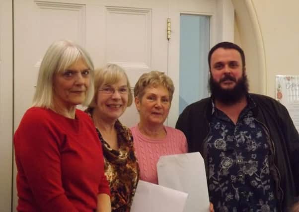 L to R, Rosalyn Staveley,Christine Austin and Betty Swann with manager Ben Rickett.