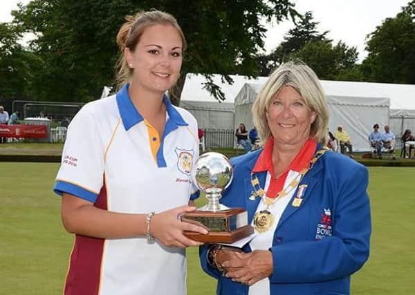 Hannah Overton receiving her trophy for coming second in a national competition at Leamington Spa