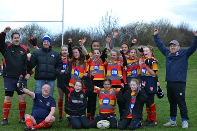 Borough Under 13 girls celebrate.