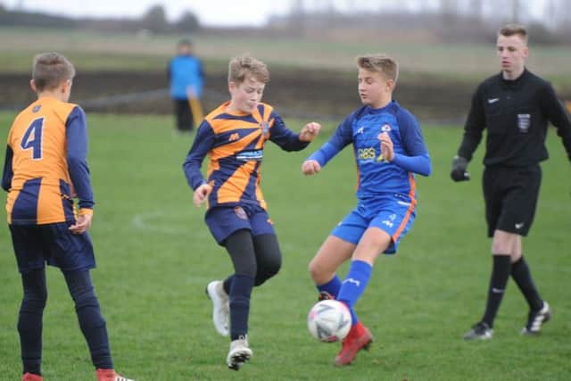 Action from the game between Yaxley Under 14s and  Glinton and Northborough Amber. Yaxley won 5-1.