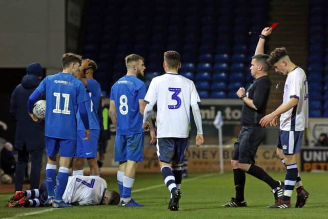 Posh midfielder Jack Gurney (8) is shown a red card in the FA Youth Cup defeat by Bury. Photo: Joe Dent/theposh.com