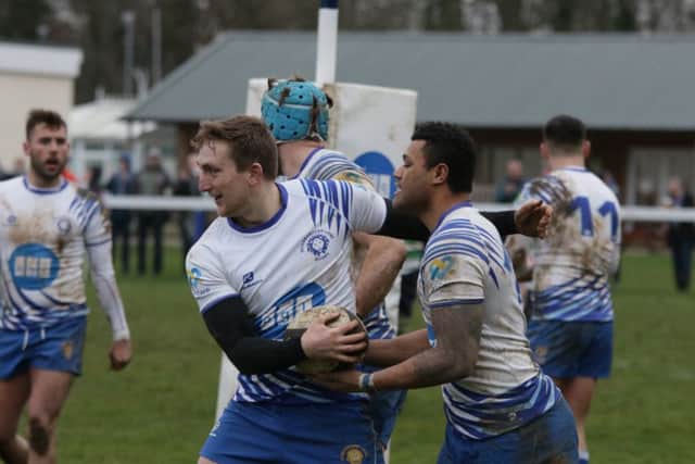 Tom Gulland celebrates after scoring the Lions winning try. Picture: Mick Sutterby