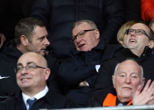 Steve Evans watches the Luton game from the directors' box. Photo: Joe Dent/theposh.com.