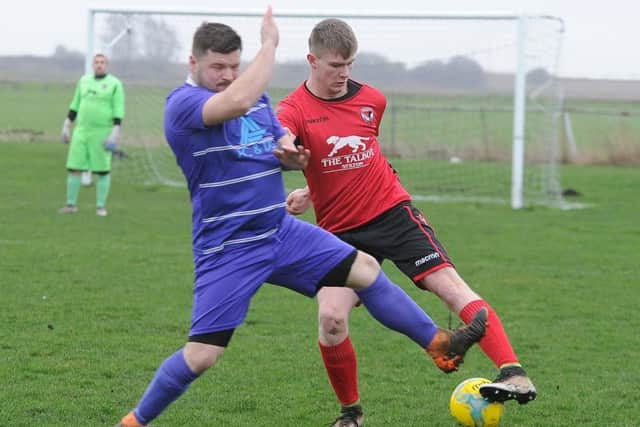 Action from Stilton United's 3-1 win at Peterborough NECI (purple) at Yaxley FC. Photo: David Lowndes.